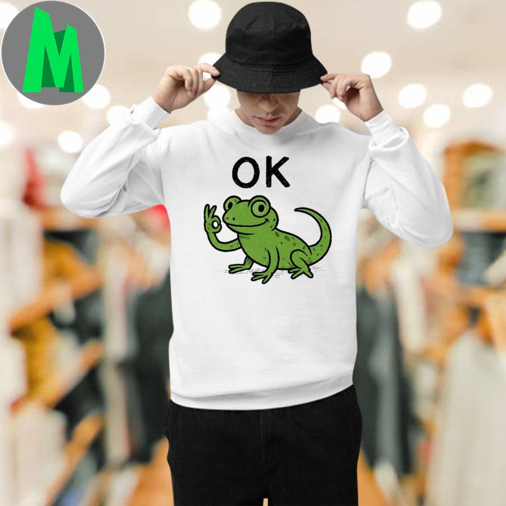 Lizard Hitting Button On Shirt