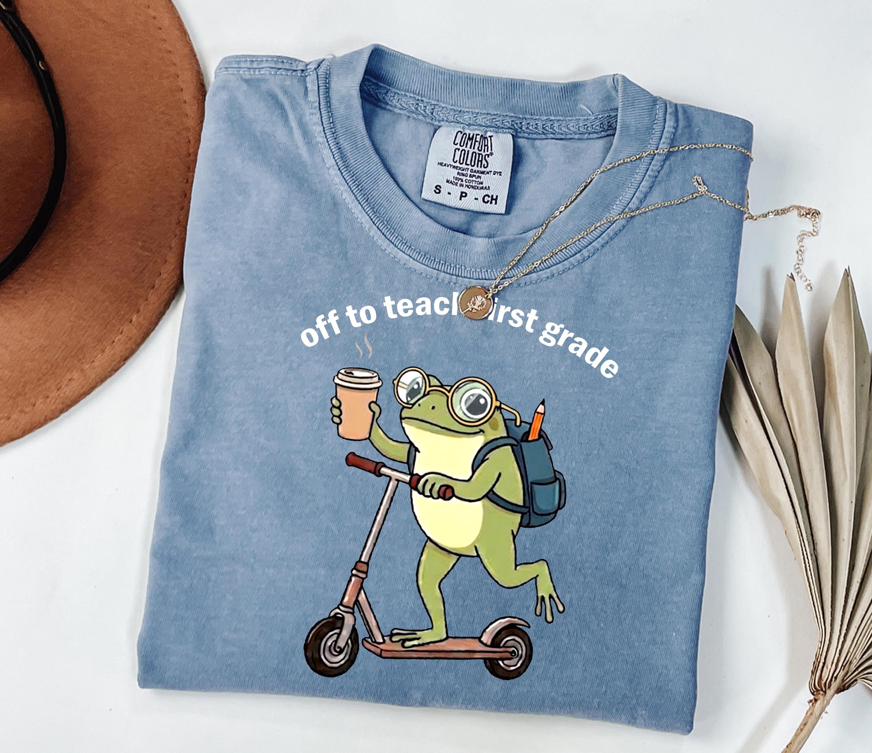 Comfort Colors First Grade 1st Grade Teacher Back School Silly Off Teach Frog Iced Coffee Tee School (1)