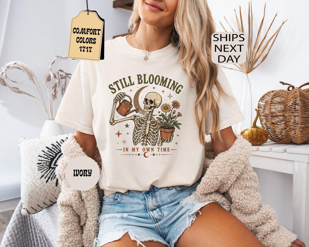 Comfort Colors Still Blooming Skeleton Halloween Mental Health Positivity Tee (1)