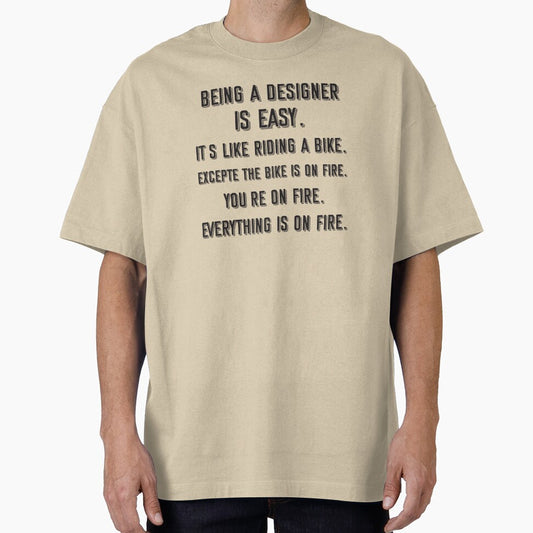 Being a designer is easy. it's like riding a bike. excepte the bike is on fire. you're on fire. everything is on fire. - Funny designer quote gift idea For Men and Women by Mmmm3344