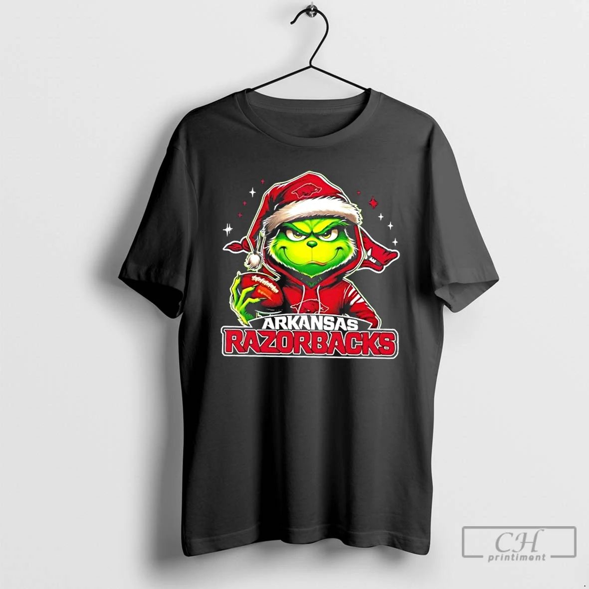 Premium Grinch Is Holding A Ball And Smiling At Arkansas Razorbacks Fans Christmas T Shirts