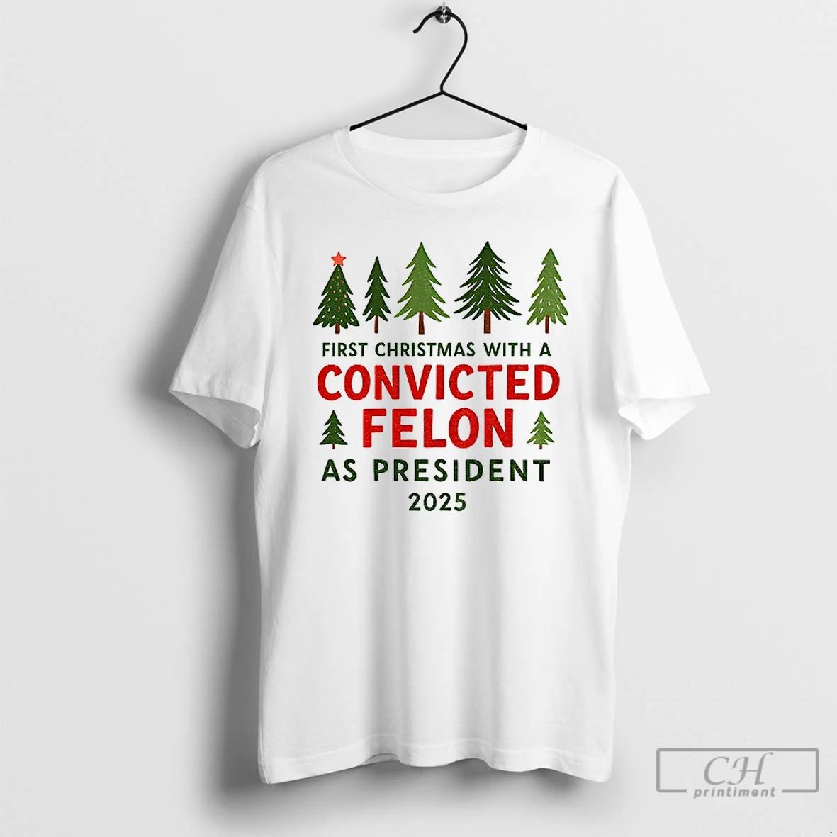 Premium Christmas Tree First Christmas With A Convicted Felon As President 2025 T Shirts