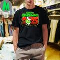 Merry Grinchmas 2025 The Grinch is wearing a Santa hat and Christmas lights Shirt