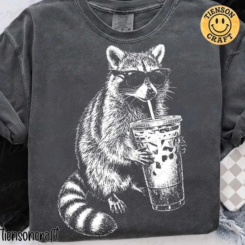 Retro Raccoon Drinking Iced Coffee Aesthetic Comfort Tee